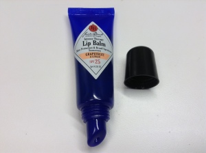 Tube packaging with plastic angled applicator
